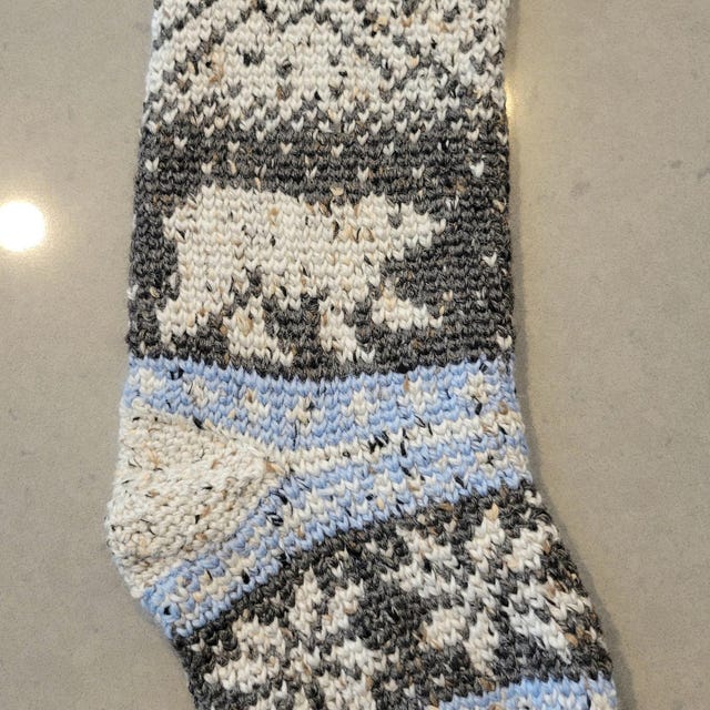 A customer's finished Polar Bear Stroll Stocking Crochet Pattern