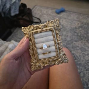 Taylor added a photo of their purchase