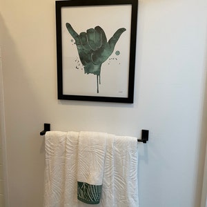 Gina added a photo of their purchase