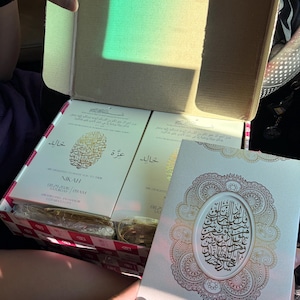 Khalid added a photo of their purchase