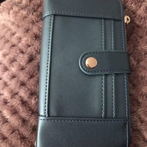 Aya added a photo of their purchase