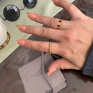 Nikki added a photo of their purchase
