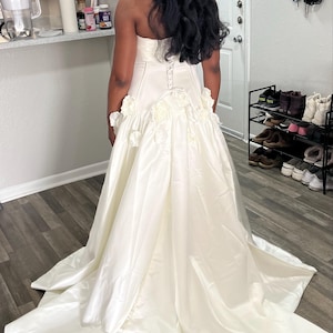 tosin added a photo of their purchase