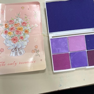 Sarah added a photo of their purchase