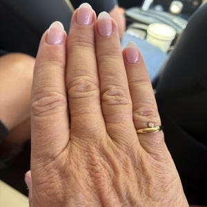Risa added a photo of their purchase