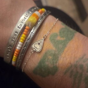 Customer photo, Planchette Charm Bracelet