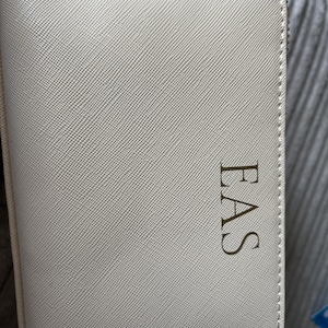 Kirstie added a photo of their purchase