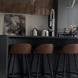 Laura added a photo of their purchase