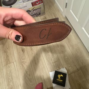 Samantha added a photo of their purchase