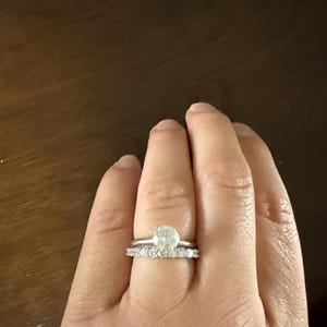 Kayleen added a photo of their purchase
