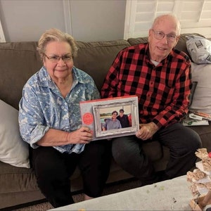 Chris added a photo of their purchase