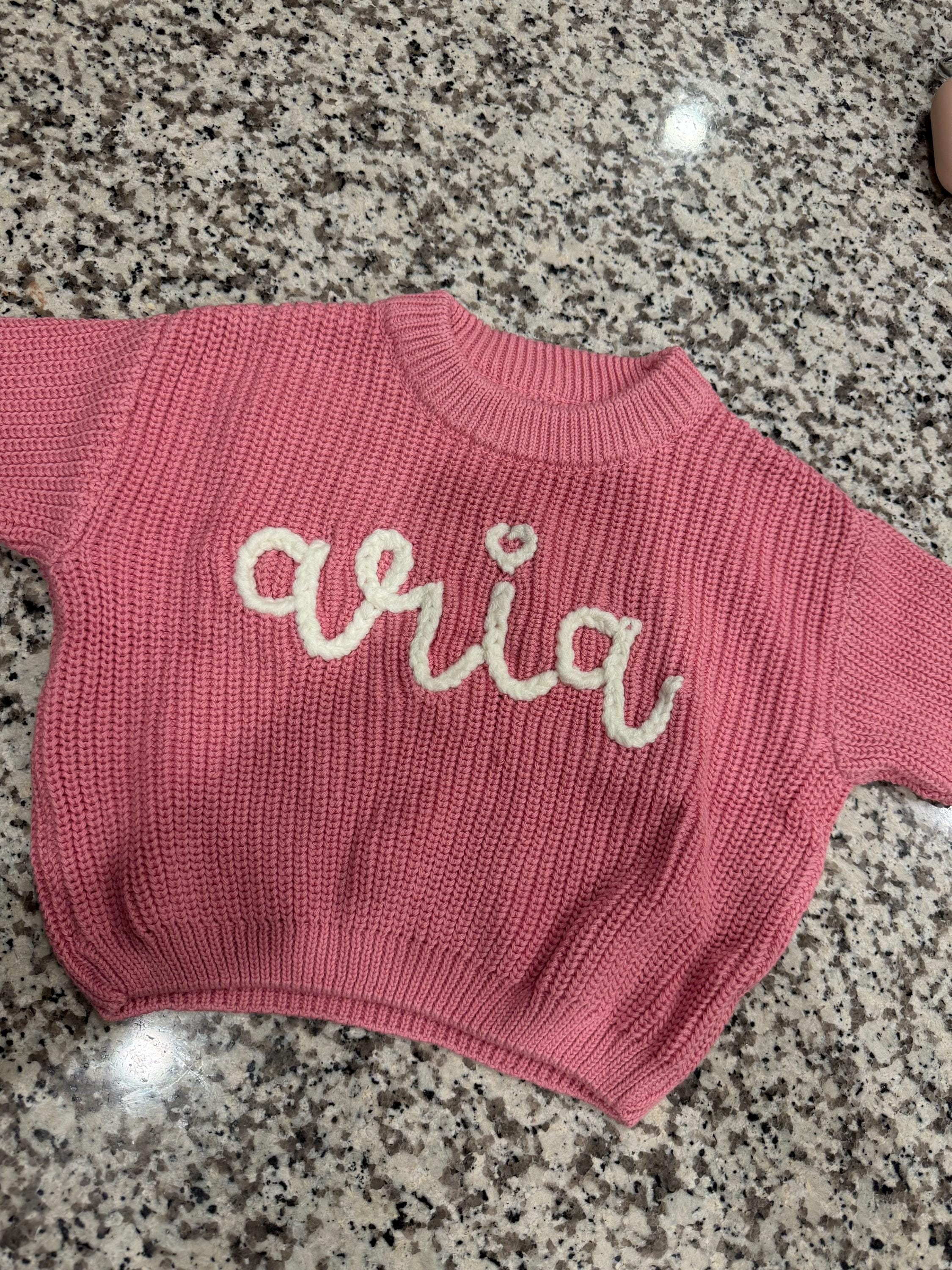 Cherished Custom Baby Sweaters: Personalize Their Name with Exquisite Embroidery