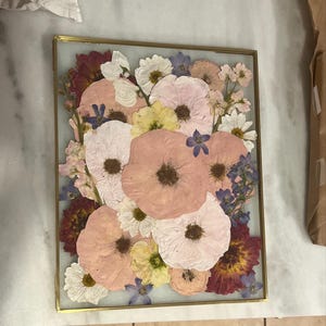 Olivia added a photo of their purchase