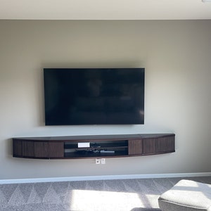 Curved floating cheap tv stand