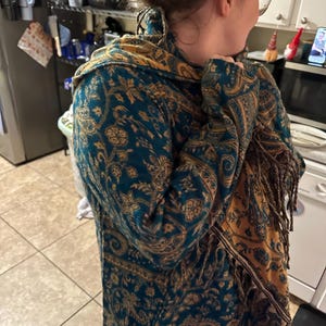 Taylor added a photo of their purchase