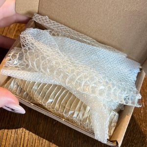 Kseniya added a photo of their purchase