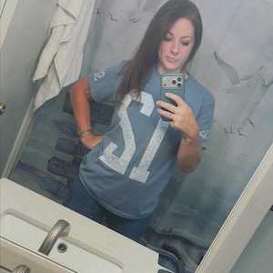 Gina added a photo of their purchase