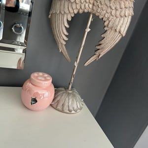 Donna ha aggiunto una foto del proprio acquisto