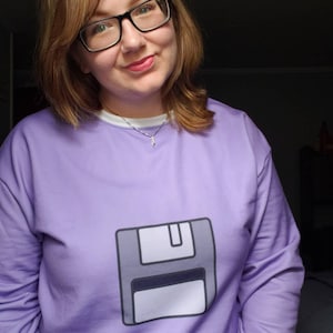 Sarah added a photo of their purchase