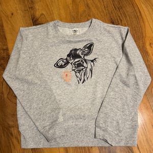 Crystal added a photo of their purchase