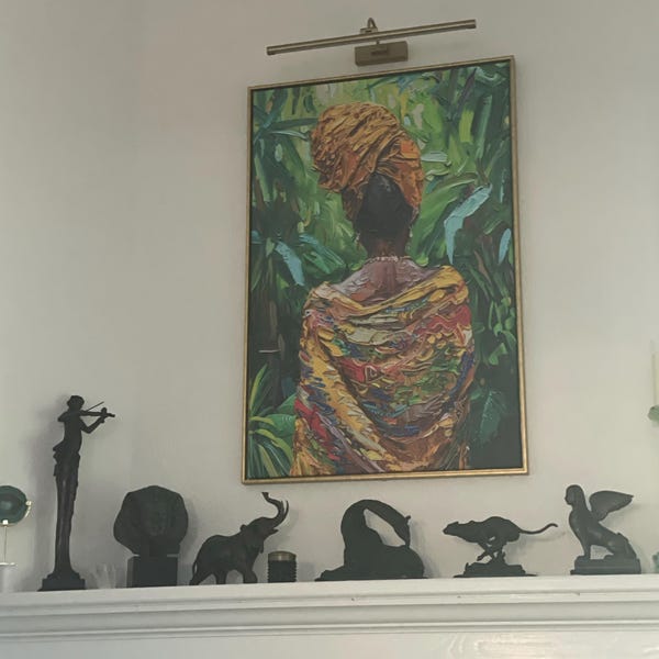 Sandra's Caribbean Woman Canvas Print, Afro Caribbean Portrait Art canvas print in their home — Antarmada