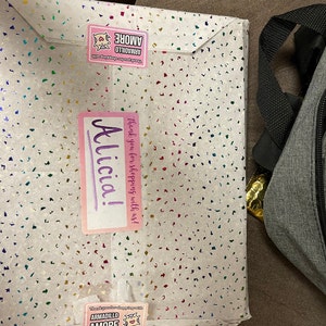 Alicia added a photo of their purchase