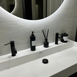 Joanna added a photo of their purchase