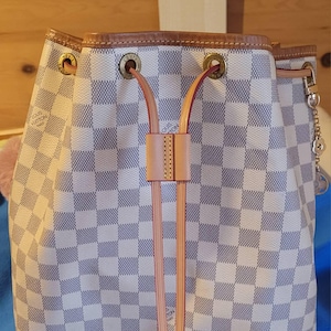 Nahyah added a photo of their purchase