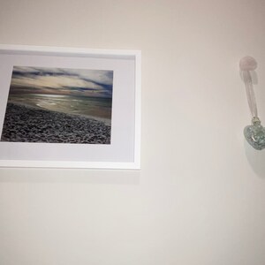 Sarah added a photo of their purchase