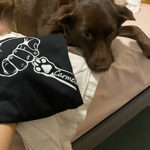 Leslie added a photo of their purchase