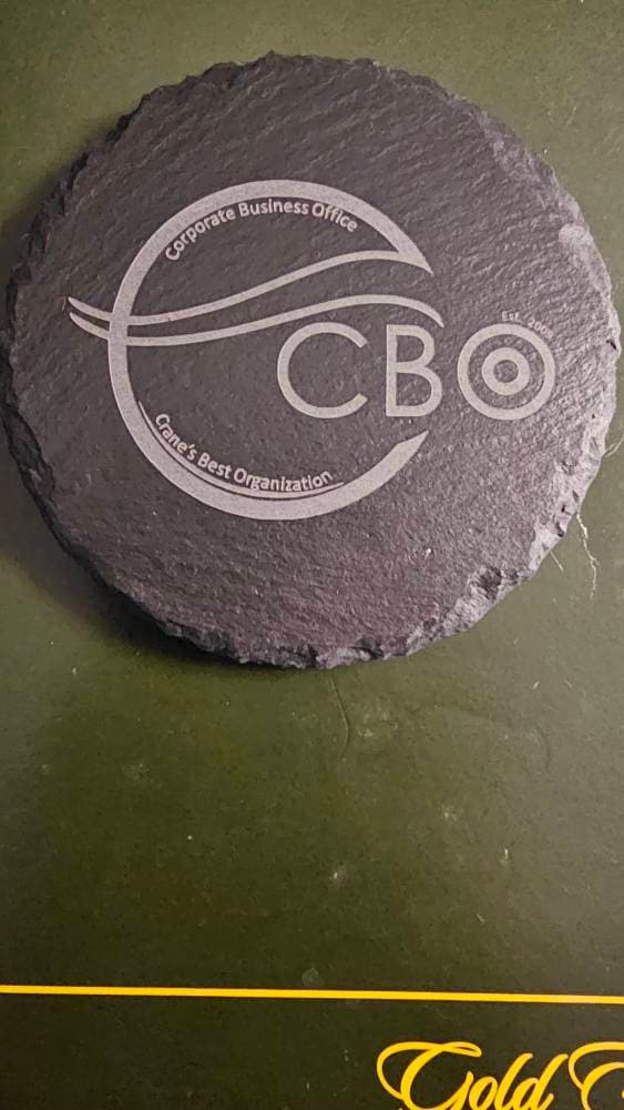 Customer photo of Custom Logo Engraved Slate Coaster from Denean