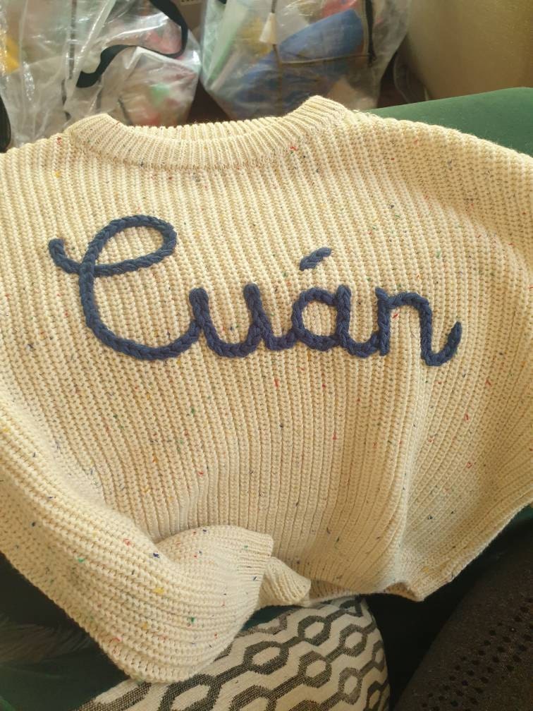 Cherished Custom Baby Sweaters: Personalize Their Name with Exquisite Embroidery