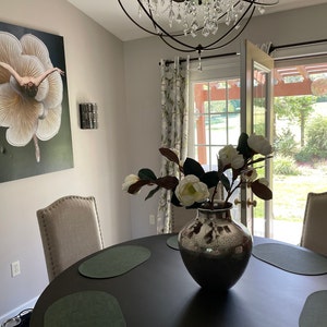 Aline added a photo of their purchase