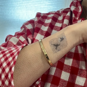 Poppy added a photo of their purchase