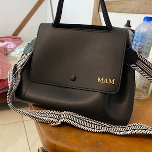 Aurore added a photo of their purchase