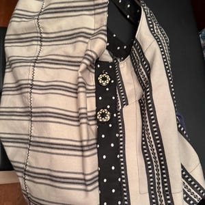 Ann added a photo of their purchase
