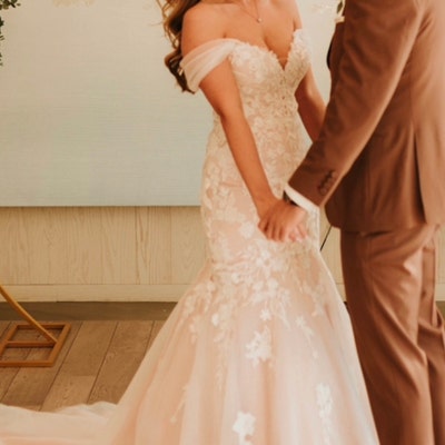 Jasmine waterfall wedding dress , deb dress (removable straps and off shoulders sleeves) with pockets.