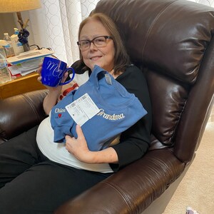 Angela added a photo of their purchase