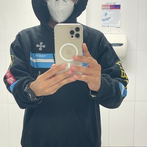Luis added a photo of their purchase