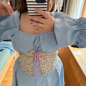 Sarah added a photo of their purchase