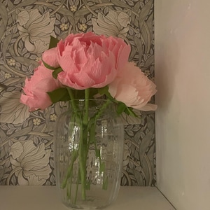 Joanne added a photo of their purchase