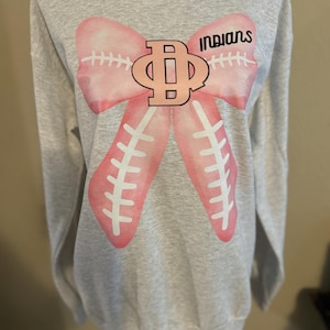 Caitlin added a photo of their purchase