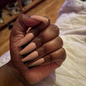 Tiera added a photo of their purchase