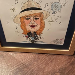 Debbie added a photo of their purchase