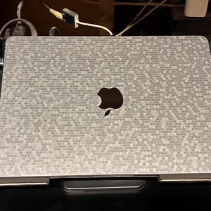 Christopher added a photo of their purchase