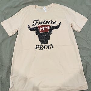 Kirsten added a photo of their purchase