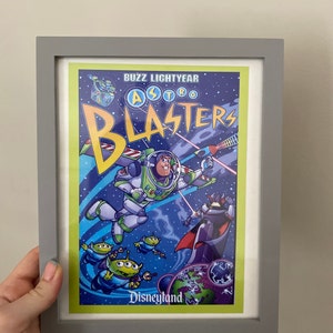 バズ・ライトイヤーのアストロブラスター - ディズニーランドプリント