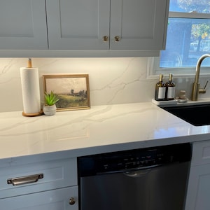 Samwyn added a photo of their purchase