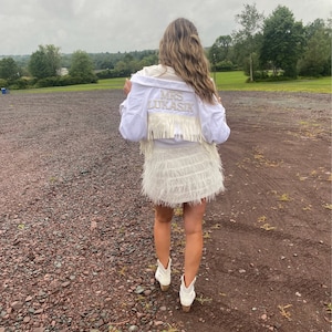 Ashley added a photo of their purchase