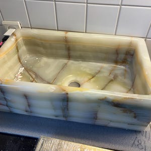 Nina added a photo of their purchase